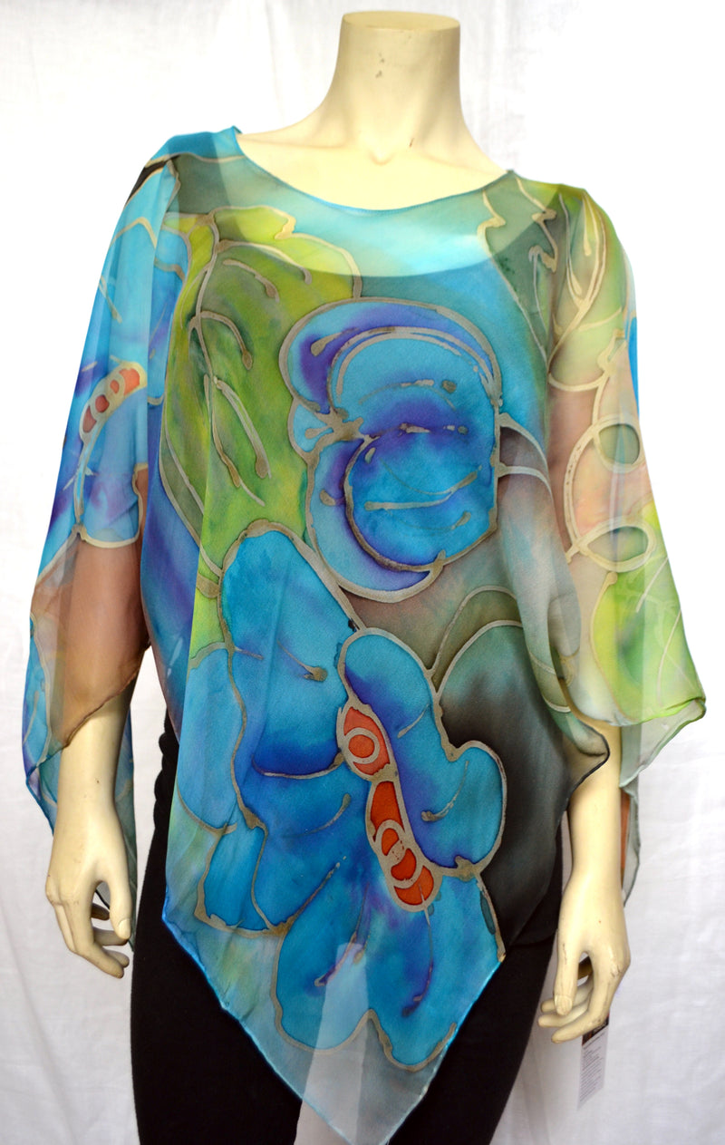 A beautiful vine growing morning glories is the inspiration for this poncho. This silk chiffon poncho is perfect to wear to a summer party or traveling in summer ! It drapes well and can also be worn as a scarf. Wear it with a camisole on a summer day and feel cool yet be covered from the sun. Wear it in deep winter over a sweater or as a scarf !