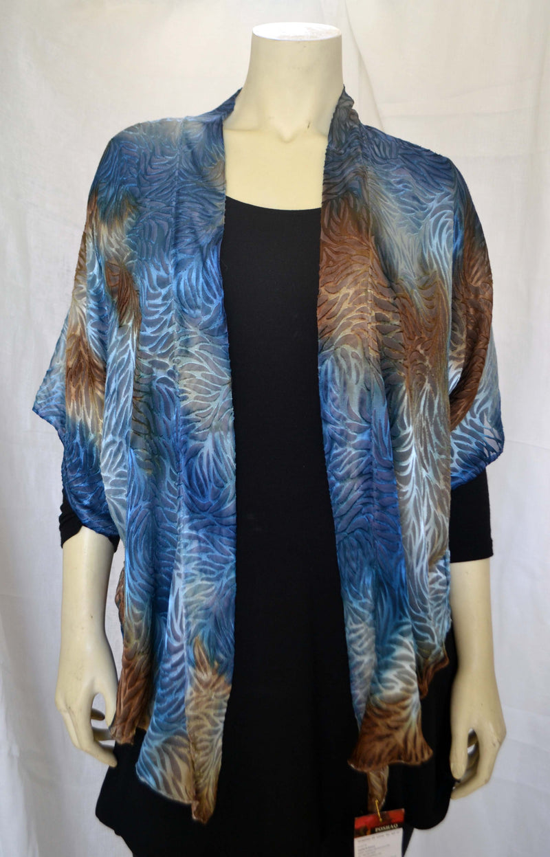 The blue brown devore jacket is worn over a dress, sweater, camisoles. They can be hand washed or dry cleaned.