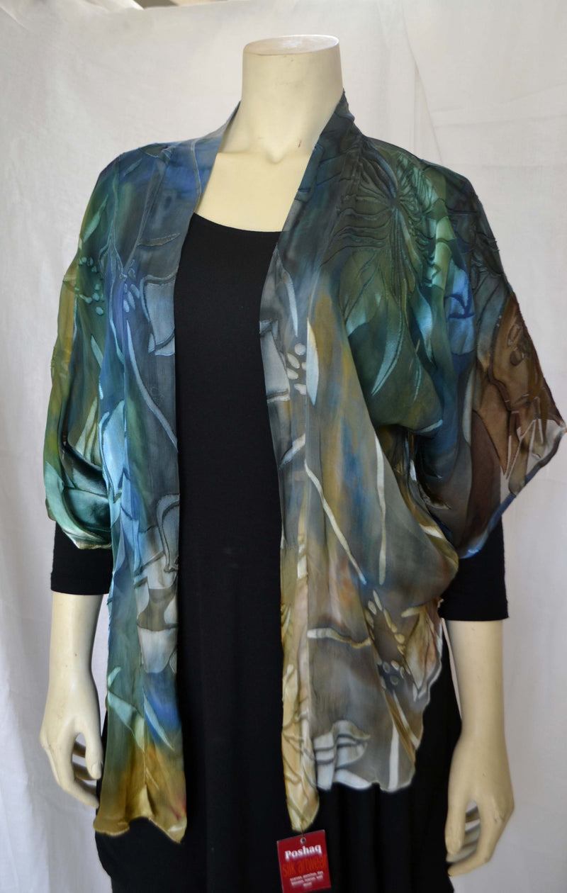 This blue green copper hand painted devore kimono jacket is available in sizes S-L. It can be hand washed or dry cleaned. These jackets have a scarf like edge and can be tied at the waist. You can wear  it with solid sweaters, camisoles, dresses. A matching silk camisole can be made separately once ordered.