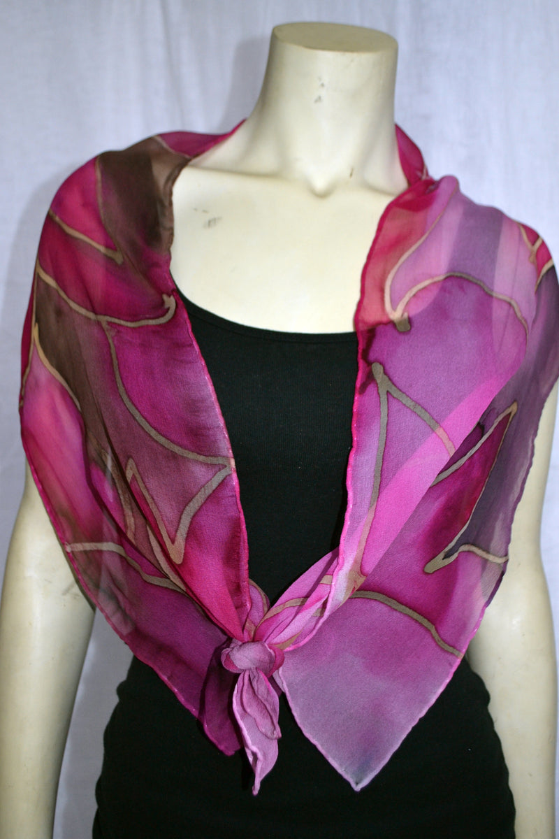 Traditional Indian designs from East of India were painted on this scarf. The scarves are made with silk chiffon. The scarves in the picture are 12"/60". They are painted with gutta resist and silk dyes. After steaming for 14 hours, the dyes are permanent. They can be hand washed or dry cleaned.